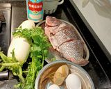 A picture of step 1 of Soup Tilapia Fish with white radish & Eggs Kantonis style.