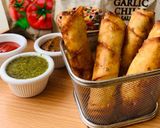 A picture of step 5 of Chicken and vegetable spring roll.