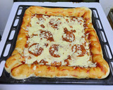 Foto del paso 8 de la receta: Pizza con borde de queso