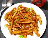 A picture of step 8 of Spicy finger chips.