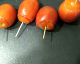 A picture of step 5 of Veggie Tomato Shots.