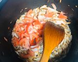 A picture of step 4 of Mutter Alo pulao.