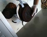 A picture of step 3 of 8 inch tall chocolate brownie cake.