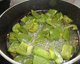A picture of step 5 of Bharela Bor Marcha Nu Shaak/ capsicum curry.