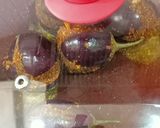 A picture of step 6 of Stuffed Brinjal Masala Fry.