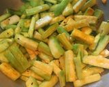 A picture of step 4 of Jal Bhara Chichinga / Steamed fritters in Snake Gourd curry.