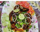 A picture of step 6 of Chicken chargah🍗.
