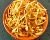 A picture of step 2 of Aloo Jhuri Bhaja.