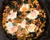 A picture of step 6 of Smoked haddock, kale and butterbean baked eggs.