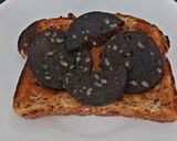 A picture of step 3 of My Simple Boiled Egg & Black Pudding on Seeded Bread Toasted 🤩.