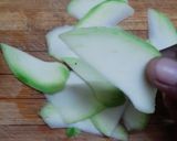 A picture of step 1 of Sweet raw mango pickle.