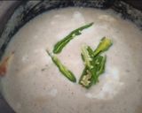 A picture of step 4 of Nawabi Paneer Korma in white Gravy.