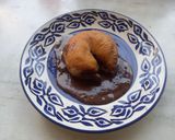 A picture of step 9 of Eggless Chocolate Bomboloni.