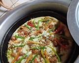 A picture of step 2 of Pizza in pateeli.