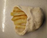 Foto del passaggio 10 della ricetta Panini a fagottini con patatine fritte wustel e formaggio Asiago