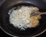 Foto del paso 2 de la receta: Sándwich al descubierto a los 3 quesos con ajo y orégano
