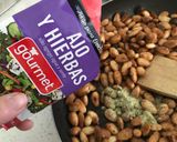 Foto del paso 8 de la receta: Almendras tostadas al merkén, ajo y hierbas