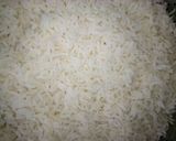 A picture of step 1 of Carrot rice.