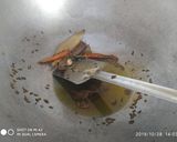 A picture of step 1 of Punjabi chicken curry.