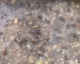 A picture of step 1 of Kali Urad Dal (Black Gram Lentils).