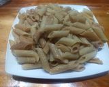 Foto del paso 3 de la receta: Pollo sazonado en ajo y cebolla con fideos dorados