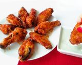 Foto del paso 10 de la receta: Alitas de pollo al horno con salsa Buffalo, acompañadas de salsa de queso azul