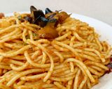 A picture of step 6 of Fried Baby Snails On Mixed Veggies Jollof Pasta.