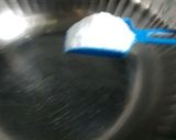A picture of step 5 of Dahi Bhalle Dahi Wada.