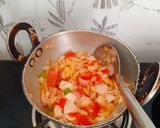A picture of step 2 of Onion and tomato vegetable.