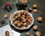 Foto del passaggio 10 della ricetta I miei baci di dama alle noci e castagne