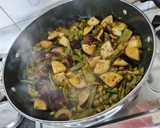 A picture of step 7 of Rasa valu Undhiyu.