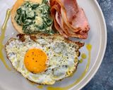 A picture of step 4 of Creamed spinach on toasted English muffins.