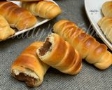 A picture of step 12 of Nutella stuffed caterpillar buns.