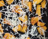 A picture of step 5 of Cheesy Pumpkin Chips.