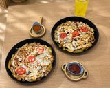 عکس مرحله 7 از دستور سیب زمینی و کالباس تنوری (شام فوری)