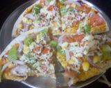 A picture of step 3 of Veggies pizza.