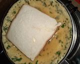 A picture of step 3 of Eggs wrapped Pasta Sandwich.