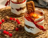 A picture of step 6 of Cream and Lotus Cookie Dessert in a Glass.