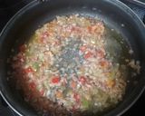 Foto del paso 4 de la receta: Rehogado de arvejas con salchichas frescas y arroz blanco