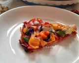 A picture of step 28 of Cauliflower thin crusted Pizza.