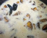 A picture of step 8 of Brinjal Kadhi with bajra roti.