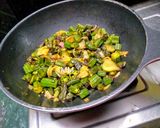 A picture of step 5 of Bhindi and Onion Fry with roasted cumin powder.