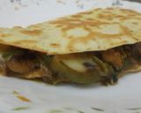 A picture of step 13 of Cheese chicken and veggies tortilla wrap.