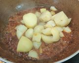 A picture of step 7 of Aloo Matar.