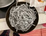 A picture of step 2 of Homemade Squid Ink Tagliolini with Jumbo Shrimp and Zucchini.