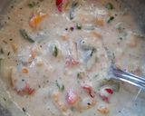 A picture of step 9 of Penne Pasta in cheesy oats white sauce.