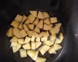 A picture of step 1 of Aloo pyaz ki sabzi.