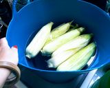 A picture of step 1 of Corn with black garlic and mango chutney butter.
