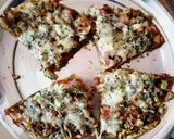 A picture of step 5 of Home made pizza in a pan.
