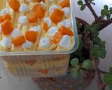 A picture of step 5 of Mango trifle.